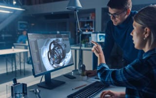 Engineer Working On Desktop Computer Screen Showing Cad Software